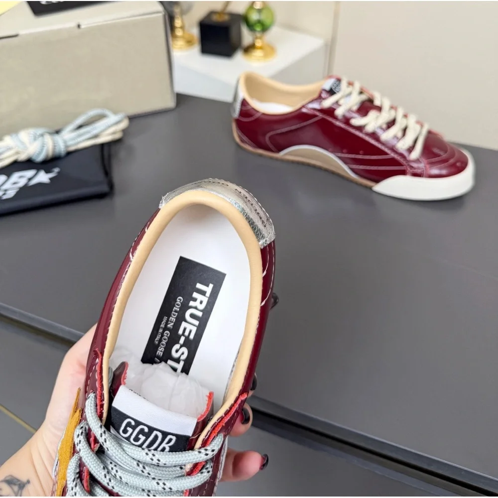 Golden Goose Women's Burgundy Leather Low-Top Sneakers with White Soles
